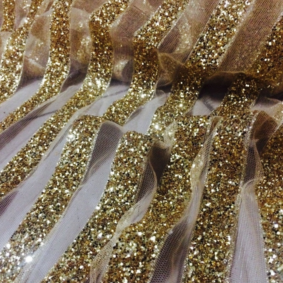 Elegant hand beaded design embroider on a glitter mesh lace-prom-sold by the yard. Blush Pink