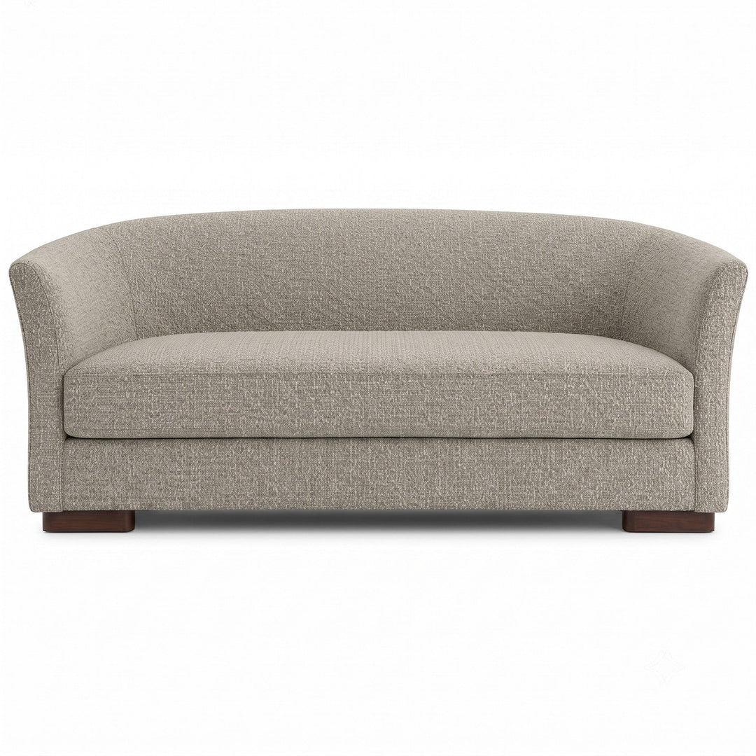 Castro Fabric in color Silver made on a sofa is a Solid Bouclé Fabric that is good for Drapery & Curtain Fabric and Upholstery Fabric