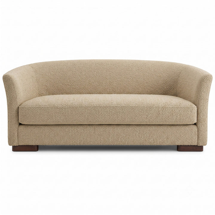 Castro Fabric in color Beige made on a sofa is a Solid Bouclé Fabric that is good for Drapery & Curtain Fabric and Upholstery Fabric