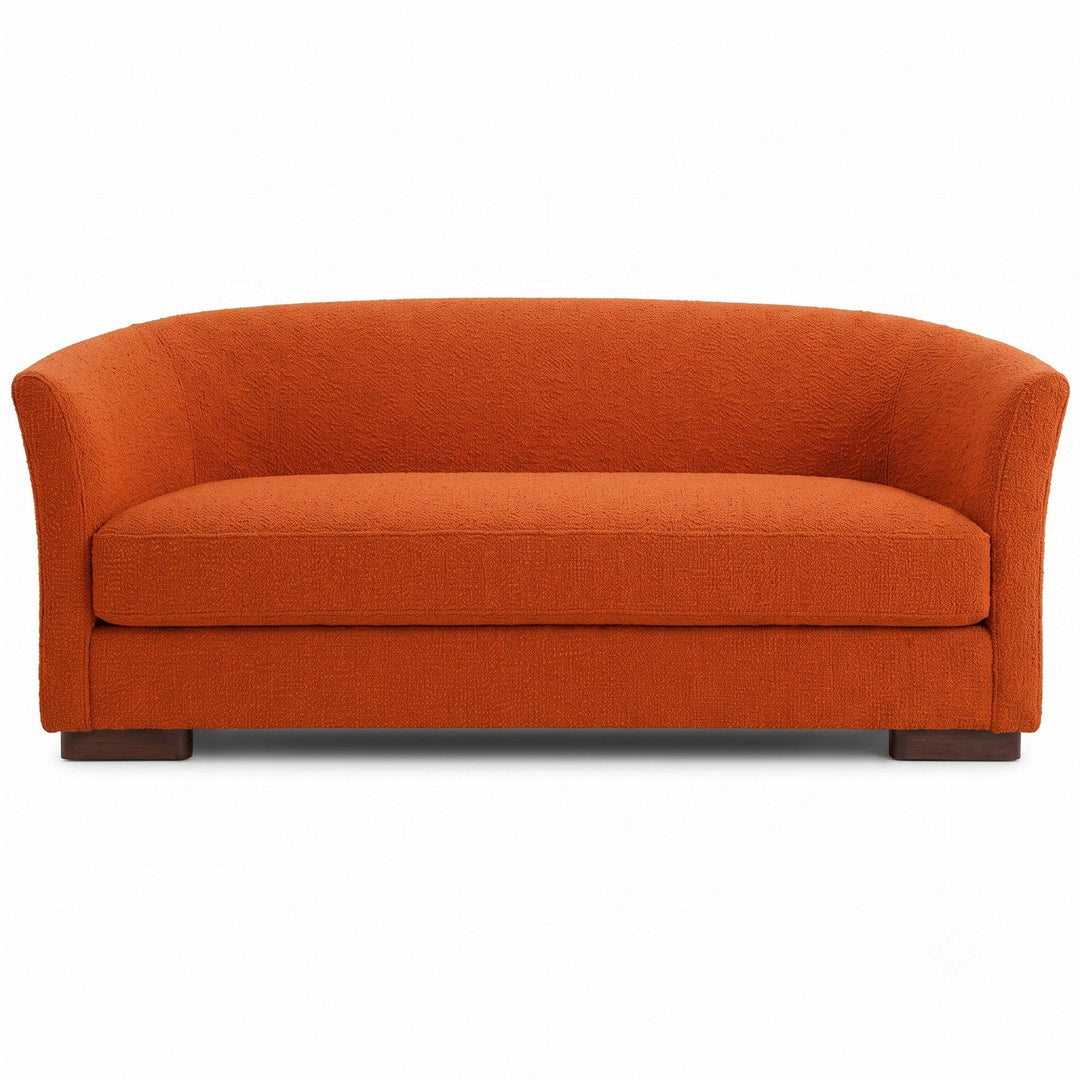 Castro Fabric in color Rust made on a sofa is a Solid Bouclé Fabric that is good for Drapery & Curtain Fabric and Upholstery Fabric