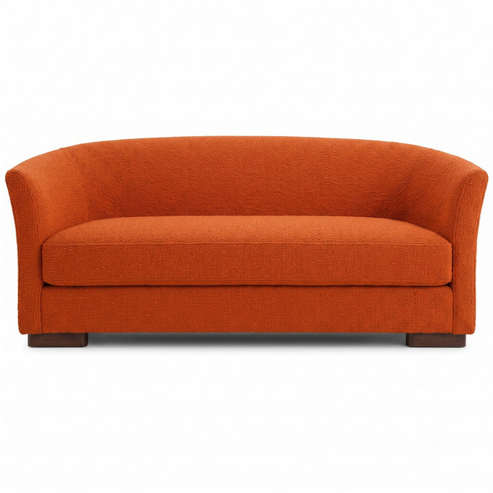 Castro Fabric in color Rust made on a sofa is a Solid Bouclé Fabric that is good for Drapery & Curtain Fabric and Upholstery Fabric