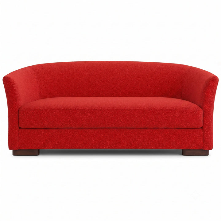Castro Fabric in color Red made on a sofa is a Solid Bouclé Fabric that is good for Drapery & Curtain Fabric and Upholstery Fabric