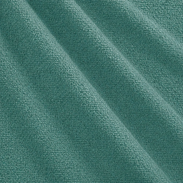 Castro Fabric in color Teal that has a wavy look is a Solid Bouclé Fabric that is good for Drapery & Curtain Fabric and Upholstery Fabric