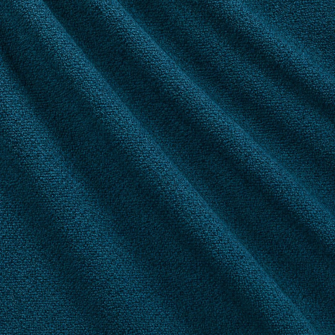 Castro Fabric in color Azure that has a wavy look is a Solid Bouclé Fabric that is good for Drapery & Curtain Fabric and Upholstery Fabric