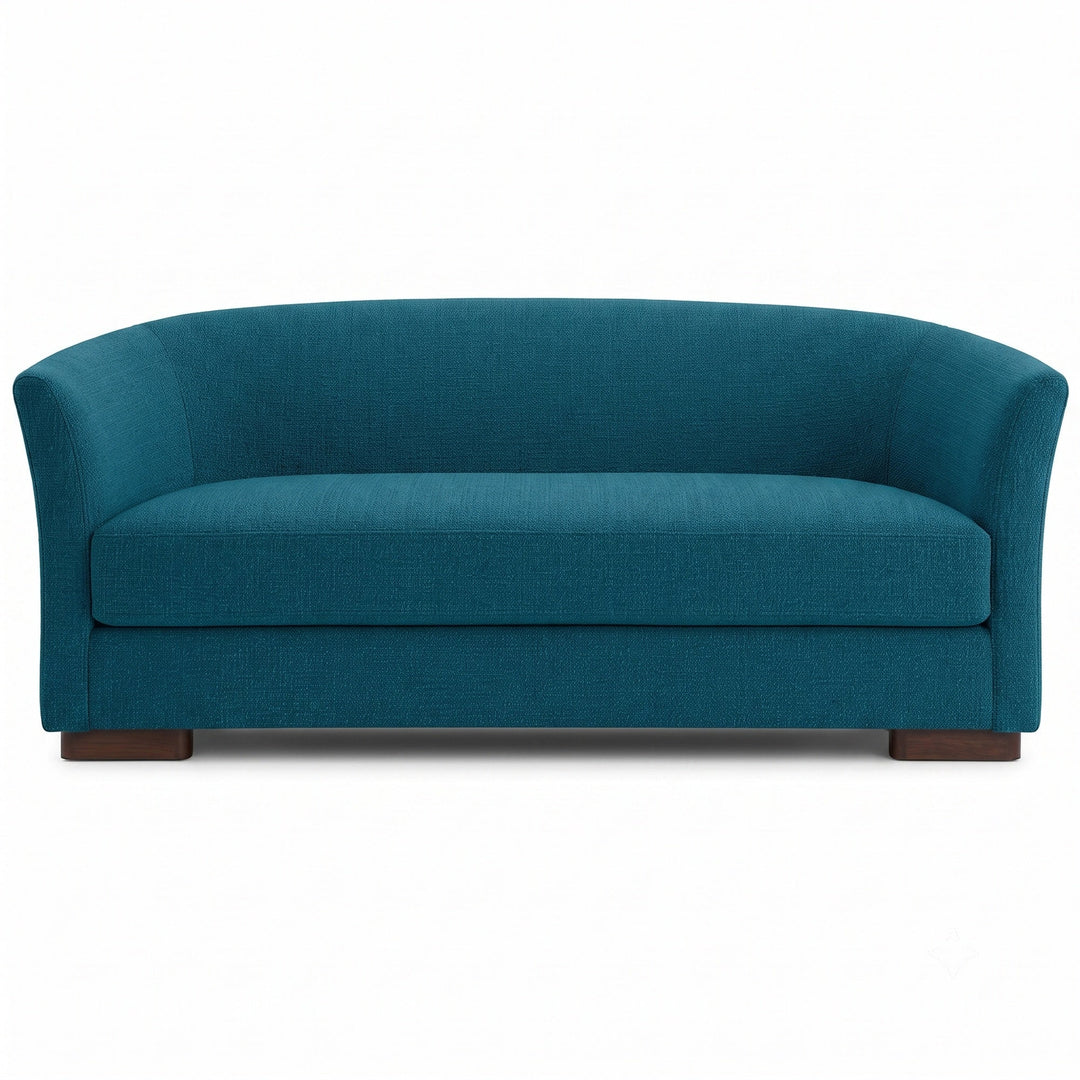 Castro Fabric in color Azure made on a sofa is a Solid Bouclé Fabric that is good for Drapery & Curtain Fabric and Upholstery Fabric