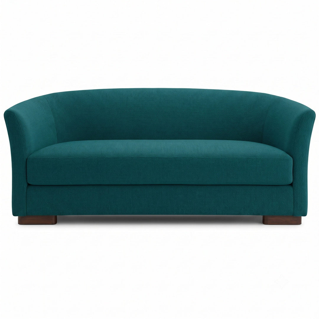 Castro Fabric in color Cerulean made on a sofa is a Solid Bouclé Fabric that is good for Drapery & Curtain Fabric and Upholstery Fabric