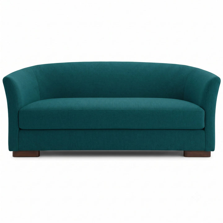 Castro Fabric in color Cerulean made on a sofa is a Solid Bouclé Fabric that is good for Drapery & Curtain Fabric and Upholstery Fabric