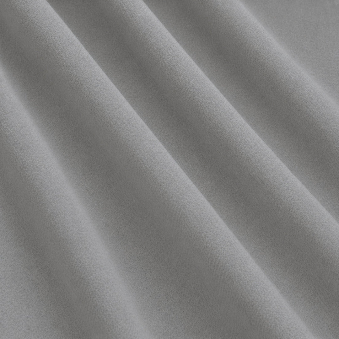 Gian Fabric in color White that has a wavy look is a Solid Shiny Velvet Fabric that is good for Drapery & Curtain Fabric and Upholstery Fabric