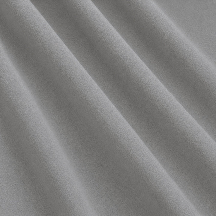 Gian Fabric in color White that has a wavy look is a Solid Shiny Velvet Fabric that is good for Drapery & Curtain Fabric and Upholstery Fabric