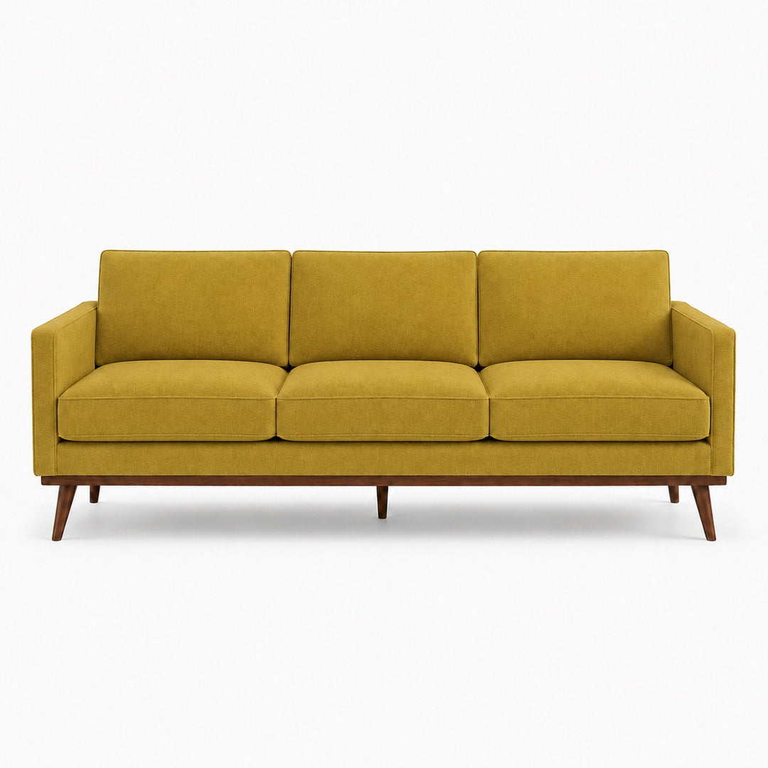 Gian Fabric in color Bronze made on a sofa is a Solid Shiny Velvet Fabric that is good for Drapery & Curtain Fabric and Upholstery Fabric