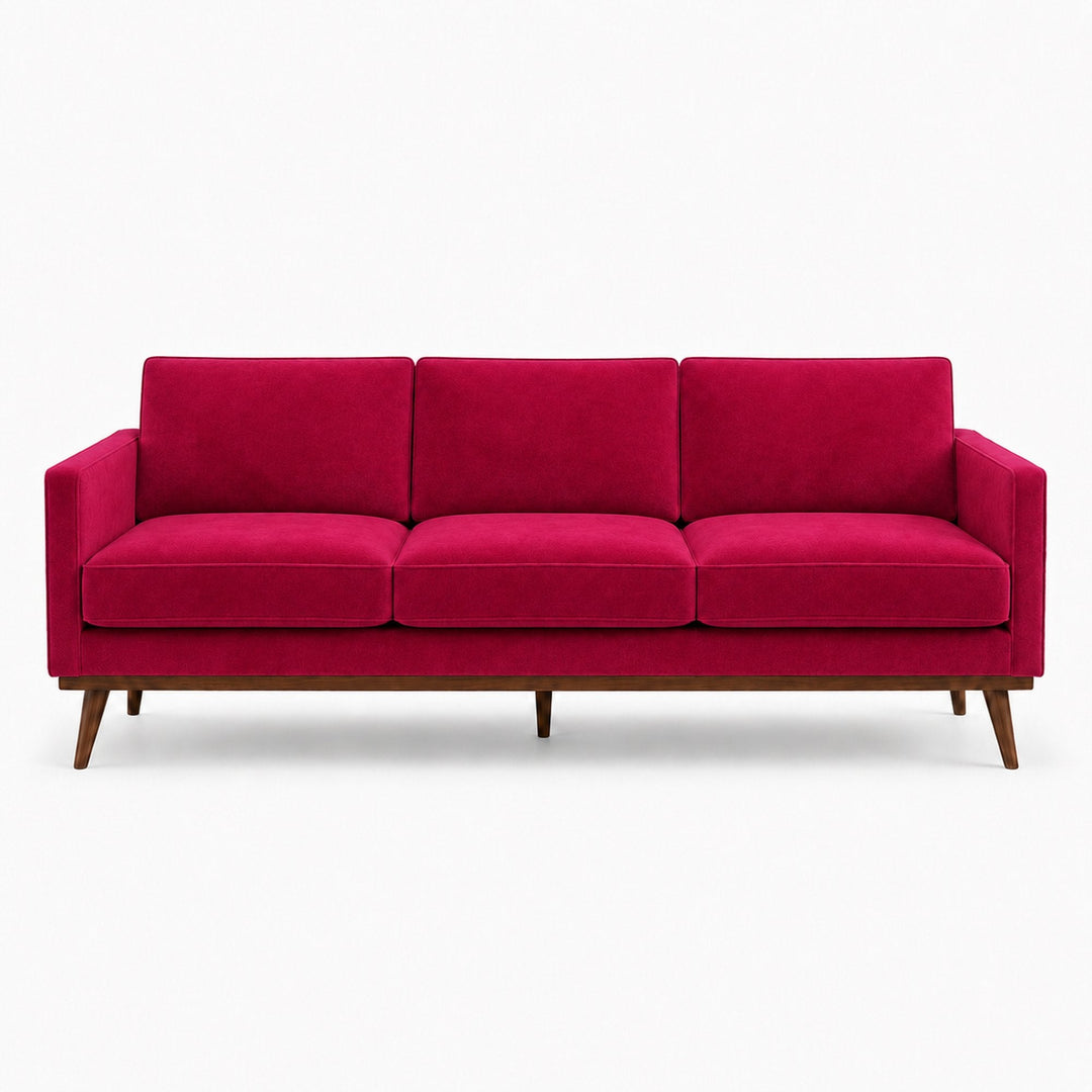 Gian Fabric in color Cranberry made on a sofa is a Solid Shiny Velvet Fabric that is good for Drapery & Curtain Fabric and Upholstery Fabric