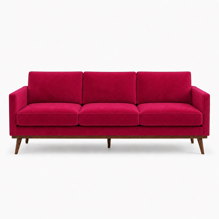 Gian Fabric in color Cranberry made on a sofa is a Solid Shiny Velvet Fabric that is good for Drapery & Curtain Fabric and Upholstery Fabric