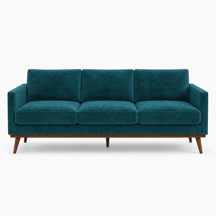 Gian Fabric in color Jade made on a sofa is a Solid Shiny Velvet Fabric that is good for Drapery & Curtain Fabric and Upholstery Fabric