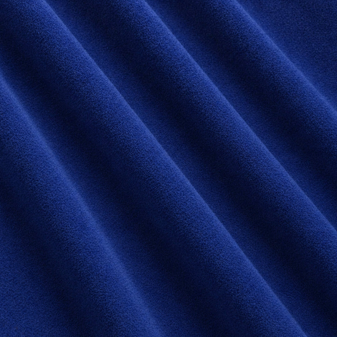Gian Fabric in color Indigo that has a wavy look is a Solid Shiny Velvet Fabric that is good for Drapery & Curtain Fabric and Upholstery Fabric