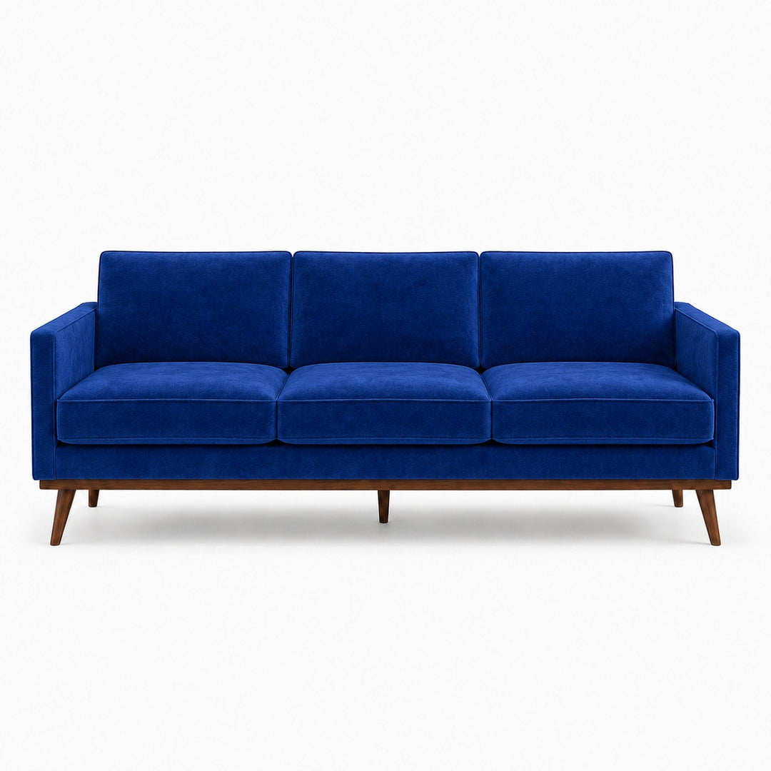 Gian Fabric in color Indigo made on a sofa is a Solid Shiny Velvet Fabric that is good for Drapery & Curtain Fabric and Upholstery Fabric