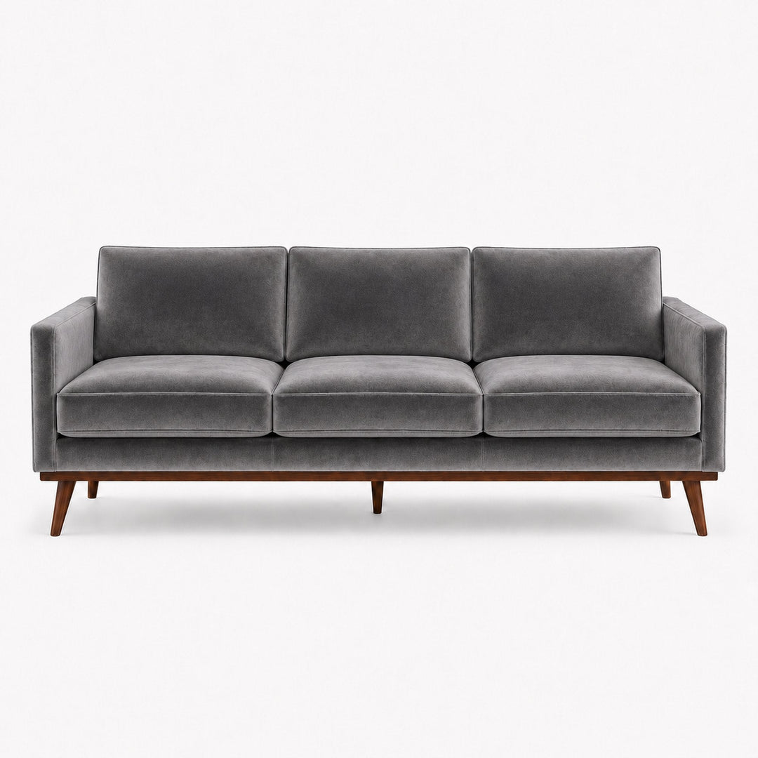 Gian Fabric in color Gray made on a sofa is a Solid Shiny Velvet Fabric that is good for Drapery & Curtain Fabric and Upholstery Fabric