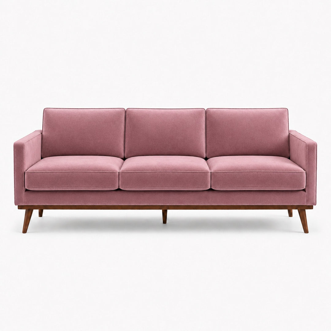 Gian Fabric in color Amethyst made on a sofa is a Solid Shiny Velvet Fabric that is good for Drapery & Curtain Fabric and Upholstery Fabric