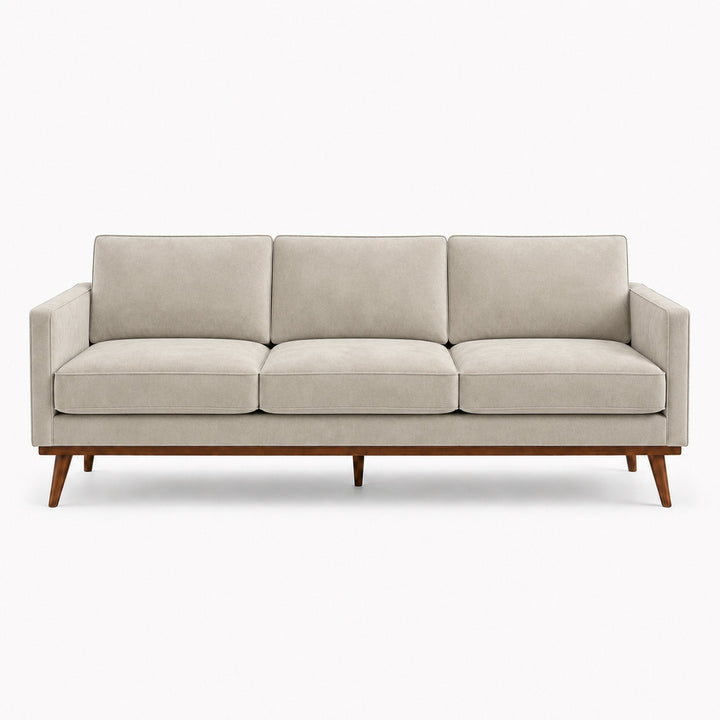 Gian Fabric in color Silver made on a sofa is a Solid Shiny Velvet Fabric that is good for Drapery & Curtain Fabric and Upholstery Fabric