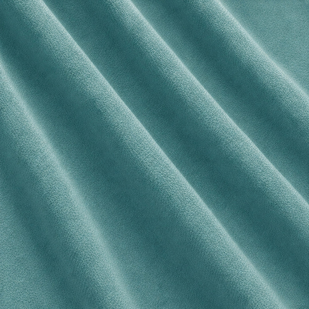 Gian Fabric in color Turquoise that has a wavy look is a Solid Shiny Velvet Fabric that is good for Drapery & Curtain Fabric and Upholstery Fabric