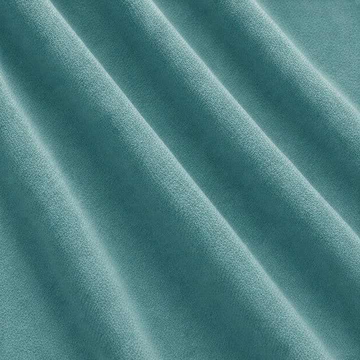 Gian Fabric in color Turquoise that has a wavy look is a Solid Shiny Velvet Fabric that is good for Drapery & Curtain Fabric and Upholstery Fabric