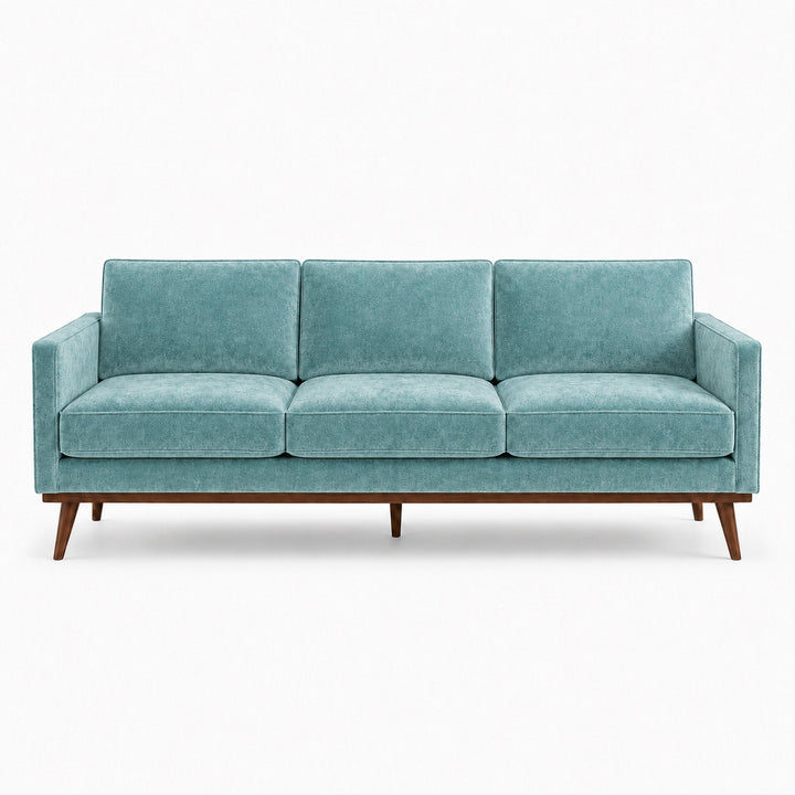 Gian Fabric in color Turquoise made on a sofa is a Solid Shiny Velvet Fabric that is good for Drapery & Curtain Fabric and Upholstery Fabric