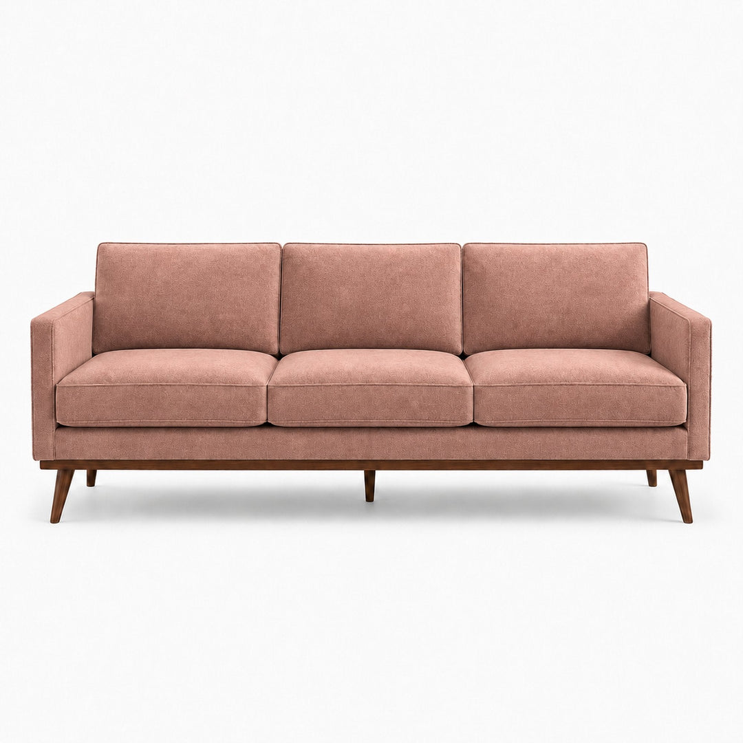 Gian Fabric in color Mauve made on a sofa is a Solid Shiny Velvet Fabric that is good for Drapery & Curtain Fabric and Upholstery Fabric