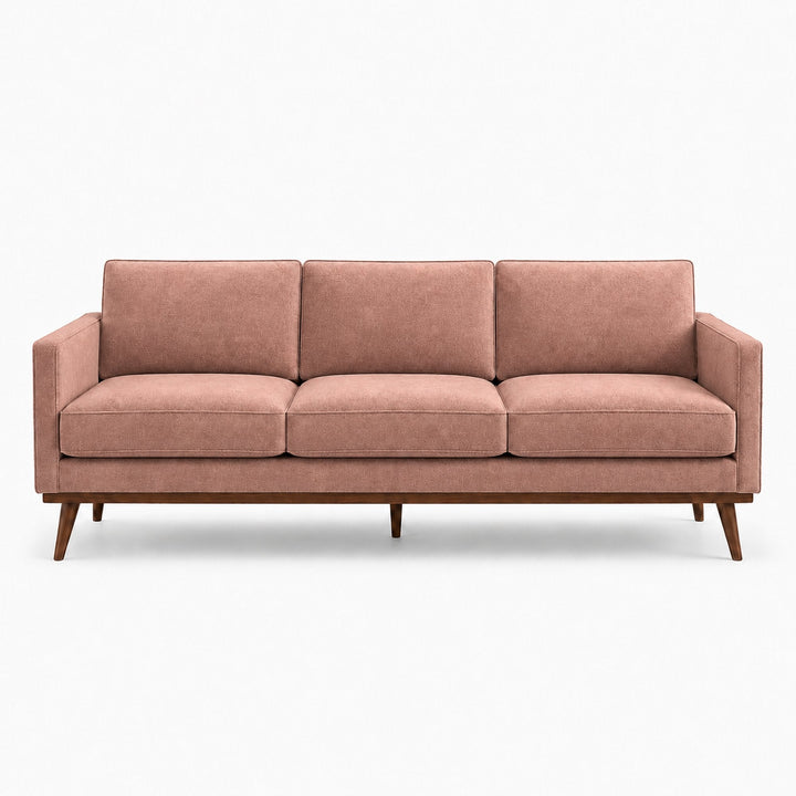 Gian Fabric in color Mauve made on a sofa is a Solid Shiny Velvet Fabric that is good for Drapery & Curtain Fabric and Upholstery Fabric