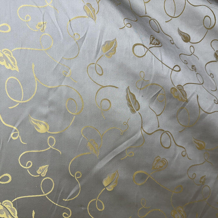 Ravelline Metallic Base Abstract Leaves Silk Fabric in Celadon