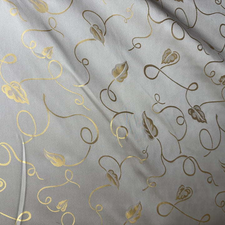 Ravelline Metallic Base Abstract Leaves Silk Fabric in Platinum