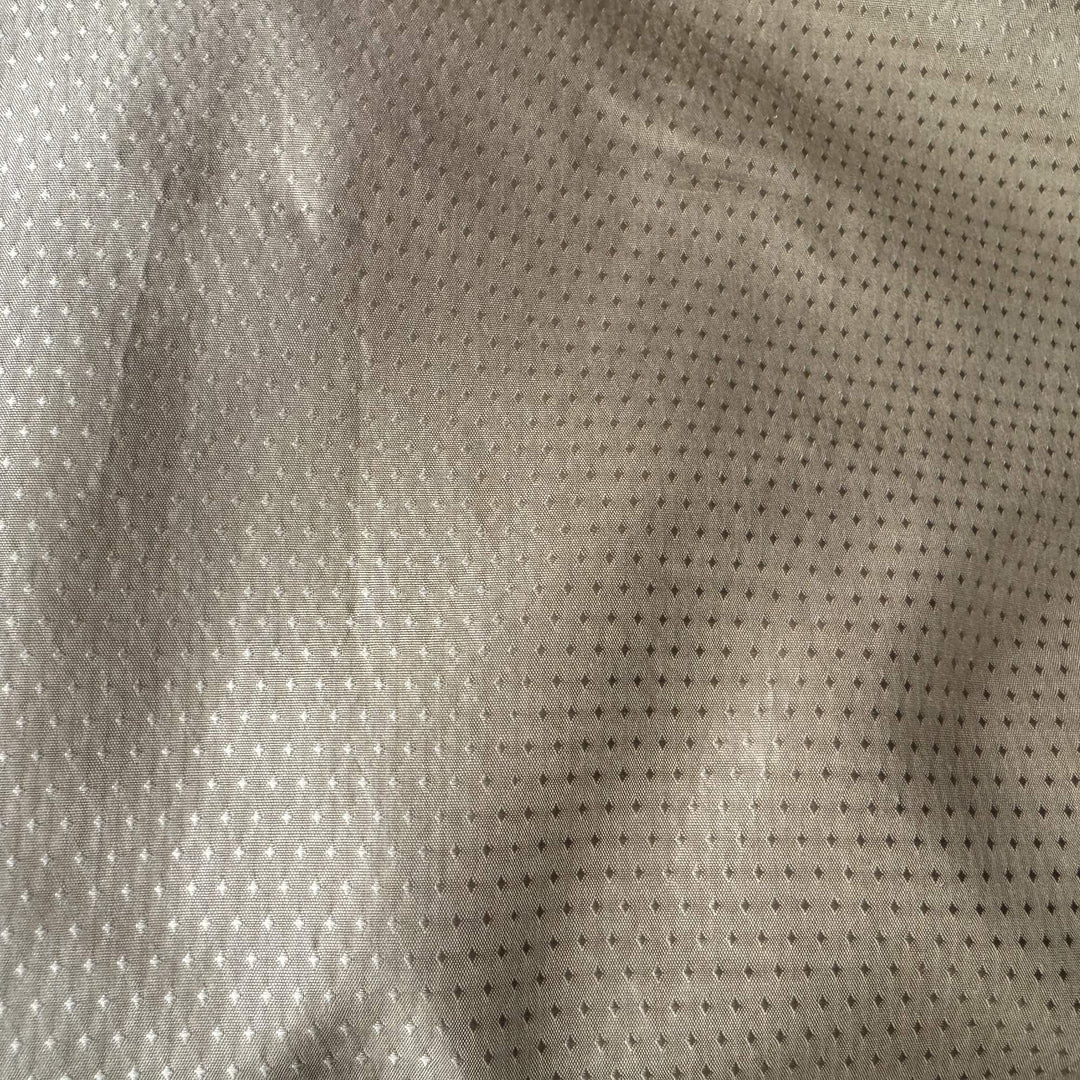 Brivanne Solid Dotted Silk Fabric in Bronze