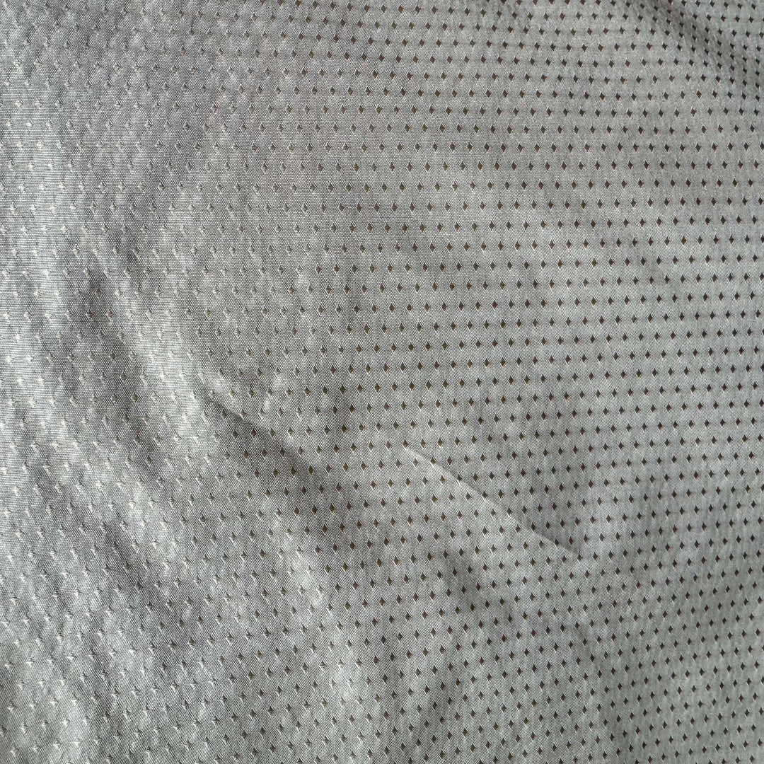 Brivanne Solid Dotted Silk Fabric in Cognac