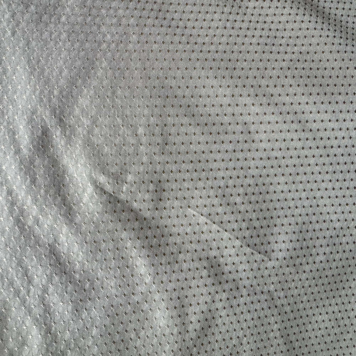 Brivanne Solid Dotted Silk Fabric in Cognac