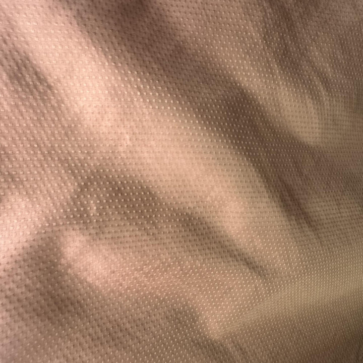 Brivanne Solid Dotted Silk Fabric in Copper