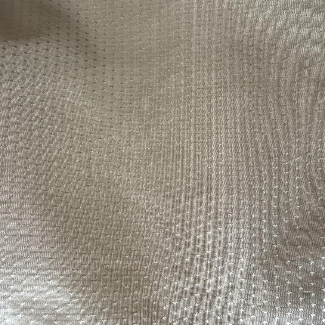 Brivanne Solid Dotted Silk Fabric in Jute