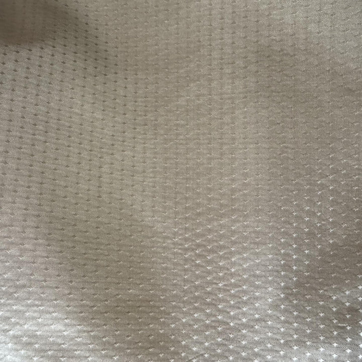Brivanne Solid Dotted Silk Fabric in Jute