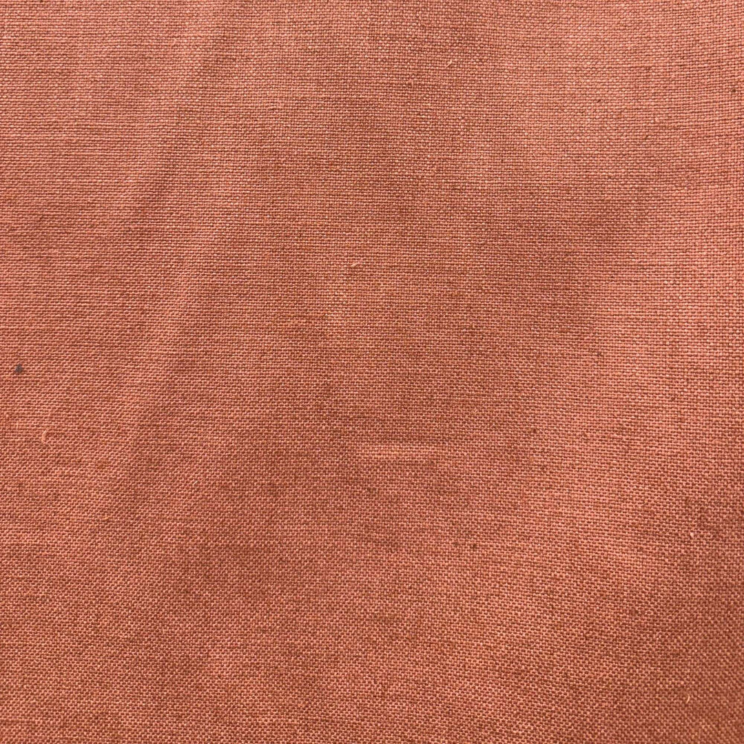 Lennon Fabric in color Terracotta is a Solid Linen Blend Fabric that is good for Drapery & Curtain Fabric and Upholstery Fabric