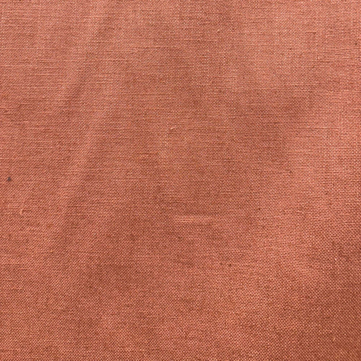 Lennon Fabric in color Terracotta is a Solid Linen Blend Fabric that is good for Drapery & Curtain Fabric and Upholstery Fabric