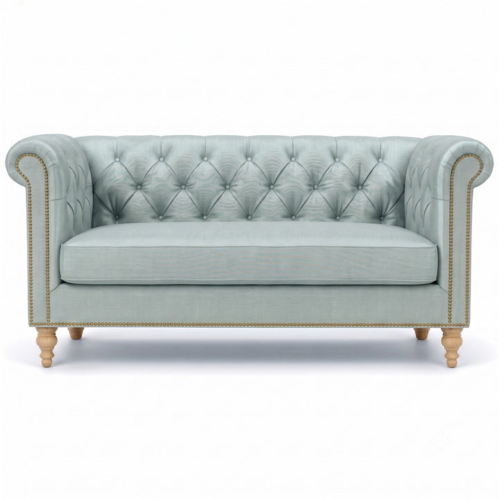 Lennon Fabric in color Spa made on a sofa is a Solid Linen Blend Fabric that is good for Drapery & Curtain Fabric and Upholstery Fabric