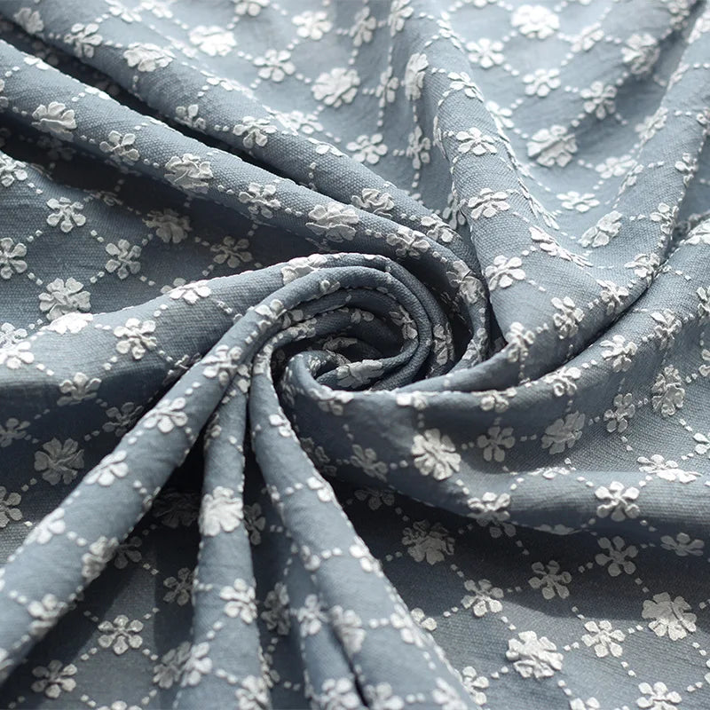Benin Geometric Small Flower Embossed Bubble Jacquard Fabric