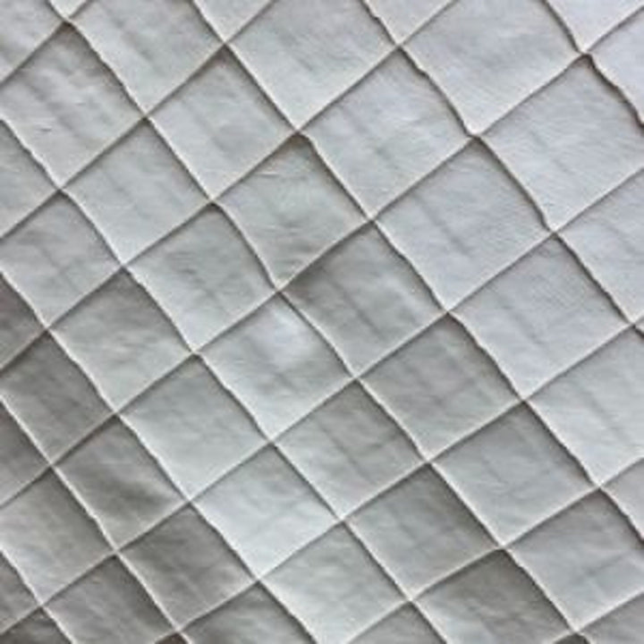 Tirelle Solid Quilted Small Diamond Silk Fabric in Wheat