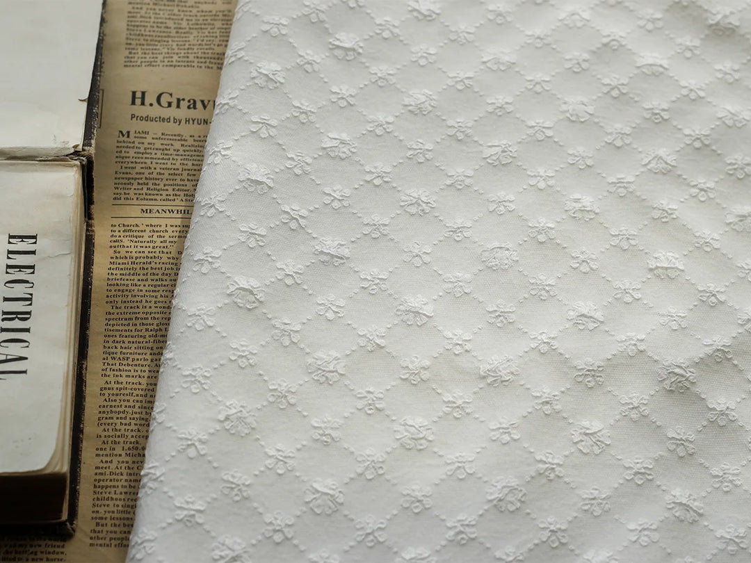 Benin Geometric Small Flower Embossed Bubble Jacquard Fabric