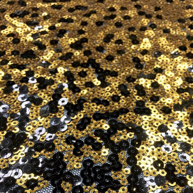 Mood Fabrics Gold and Gray Sequin Flowers Over A Black Mesh